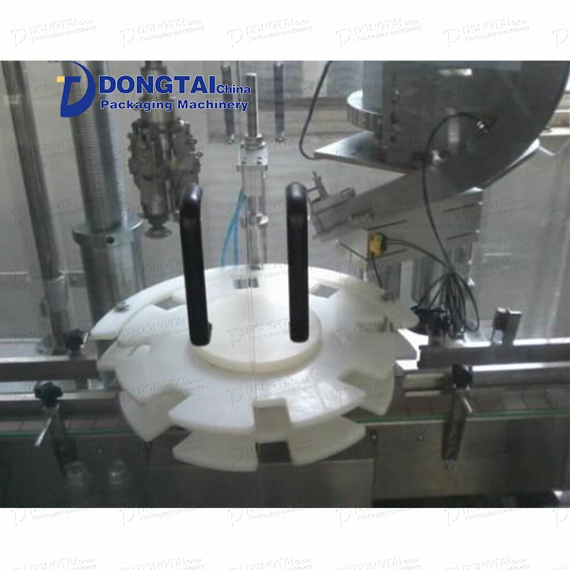 Automatic essential oil capping machine