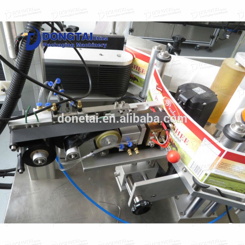 engine oil filling and labelling machine