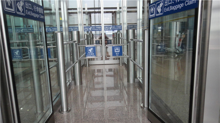 Swing barrier for airport