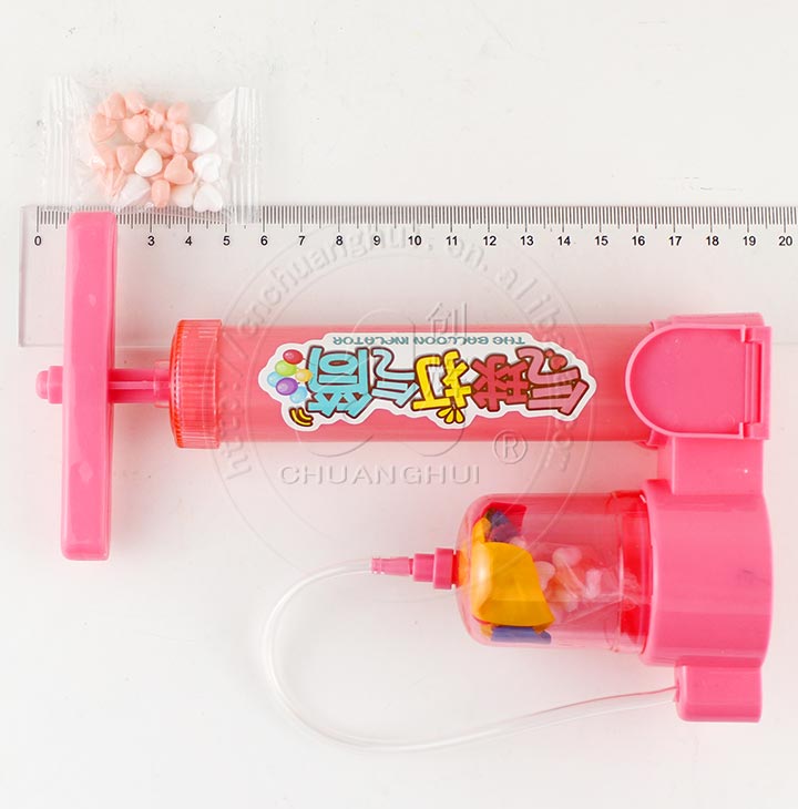 air pump toy with heart shape candy