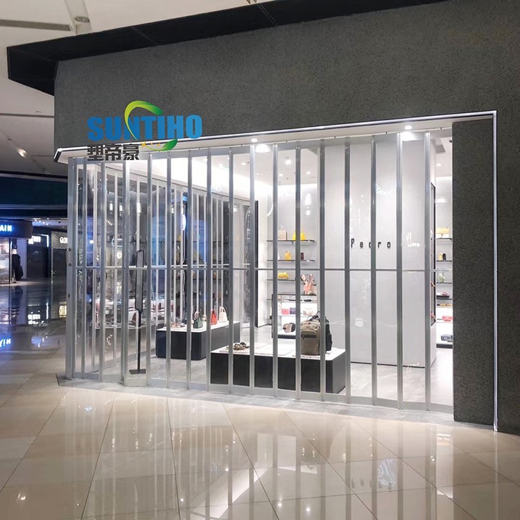 Aluminum frame PC clear polycarbonate folding door factory for supermarket and warehouse
