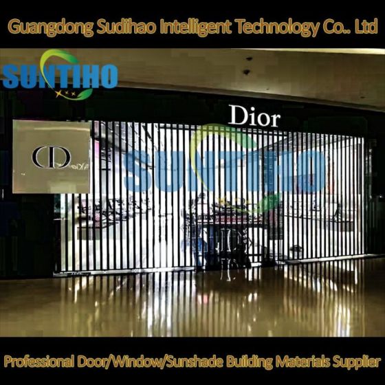 Présentation de la dernière porte pliante transparente en cristal PC en alliage d'aluminium : une nouvelle norme en matière de technologie de porte