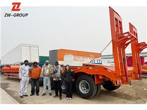 Martinho Visits ZW Group and Signs Contract for Used Shantui Bulldozer and Lowbed Semi Trailer