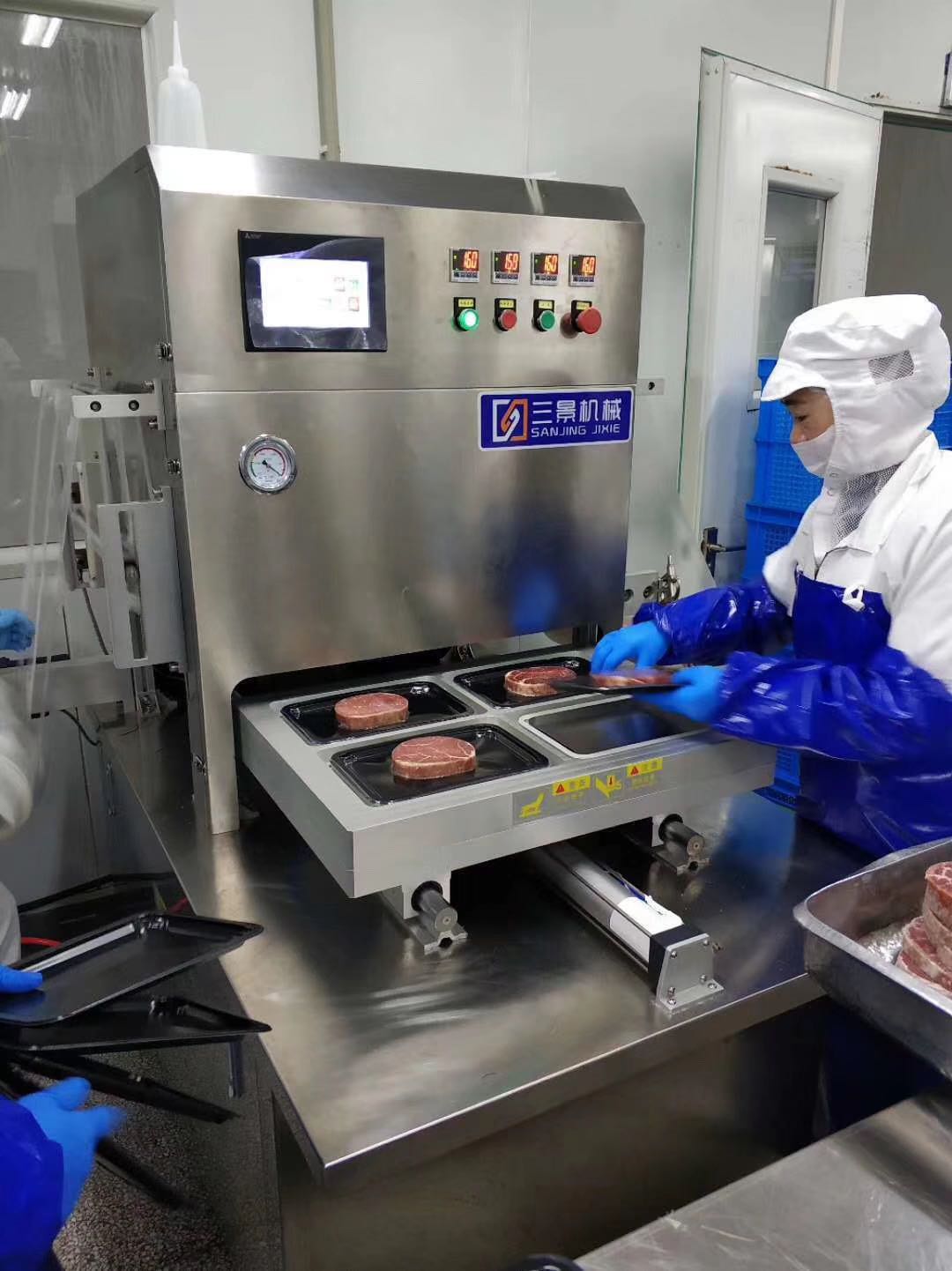 Automatische Vakuum-Skin-Verpackungsmaschine für Rindfleisch Kunden
