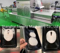 Máquina de envasado al vacío de bacalao en rodajas