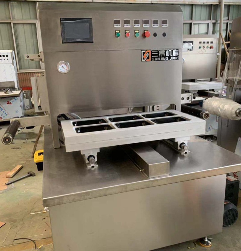 Filetes de salmón MAPA envasado en sellado de bandejas