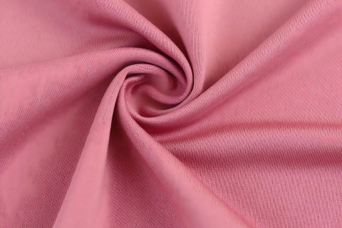 Ottieni le massime prestazioni: la potenza del tessuto a maglia per l'abbigliamento sportivo