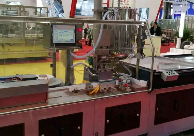 Nine-granule Suppository Filling And Sealing Machine