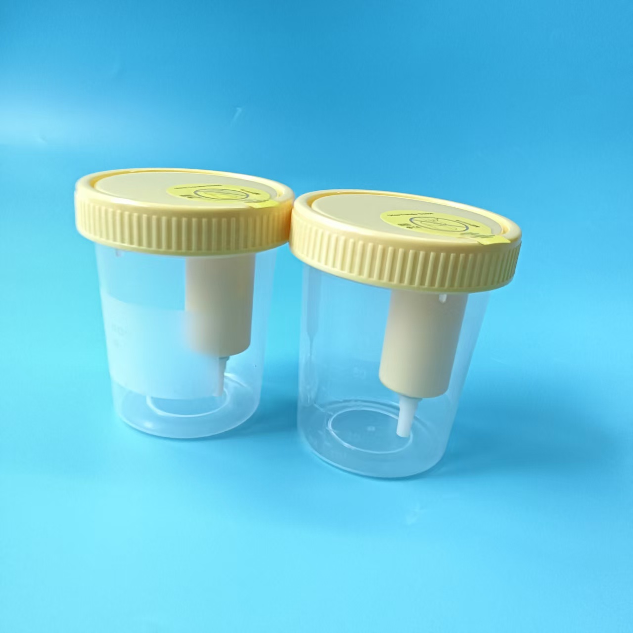 Vacuum urine cup