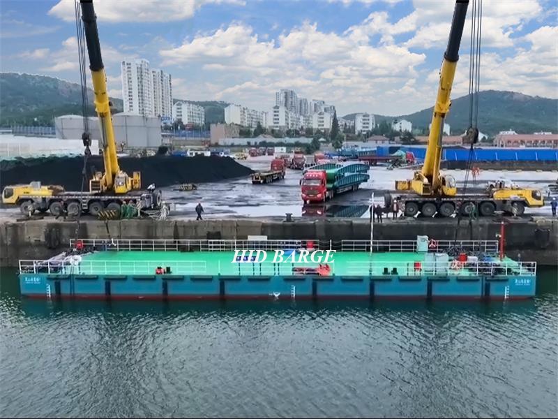 Большой многоцелевой палубный понтон СПРЯТАН
, используемый в порту Циндао