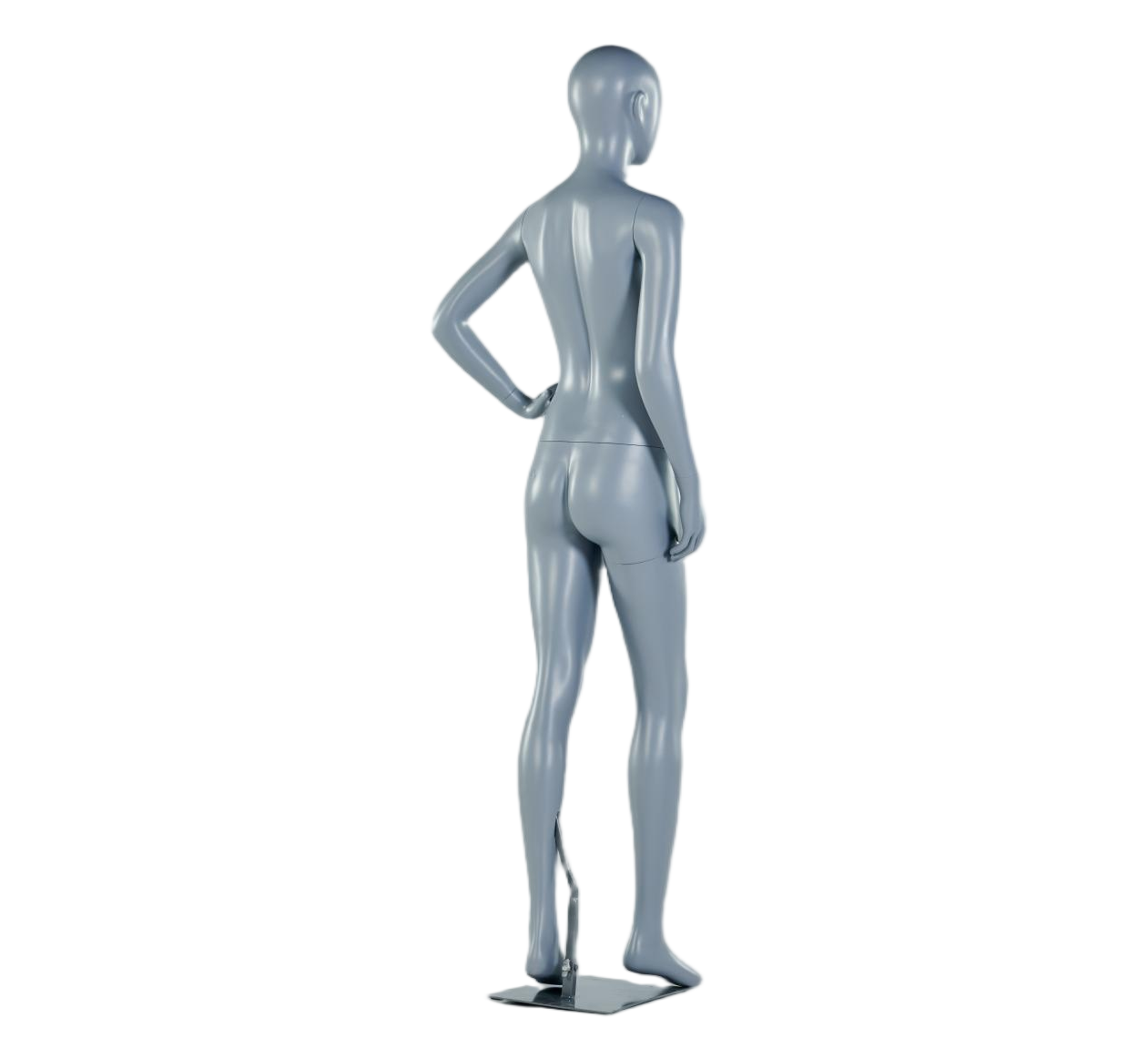 Maniquí femenino de entrenamiento con las manos en las caderas