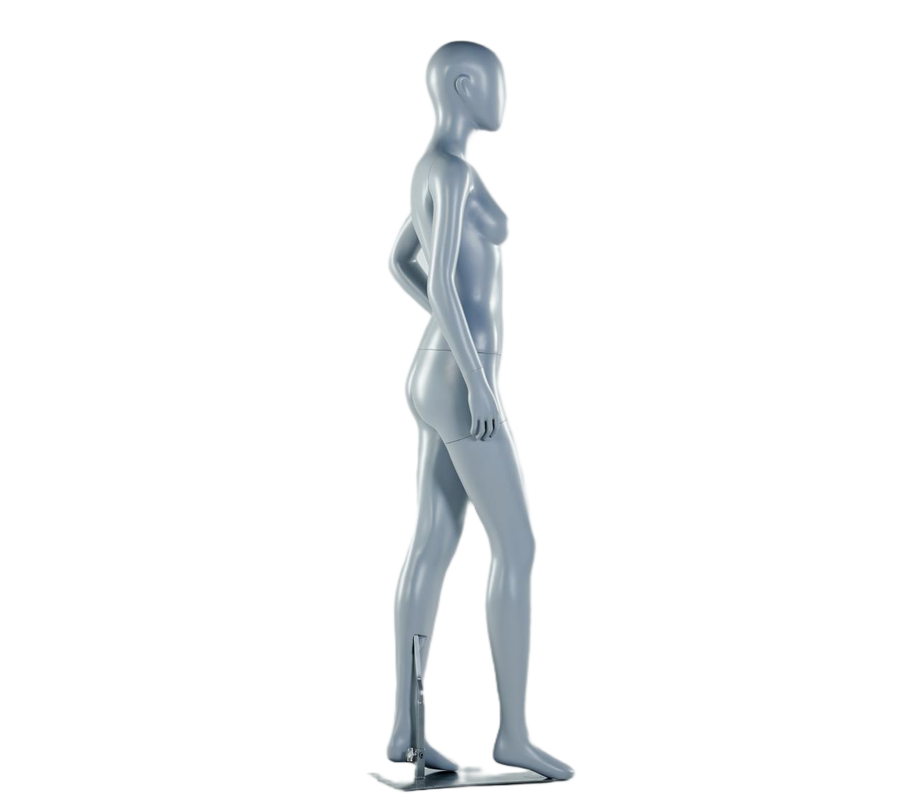 Maniquí femenino de entrenamiento con las manos en las caderas