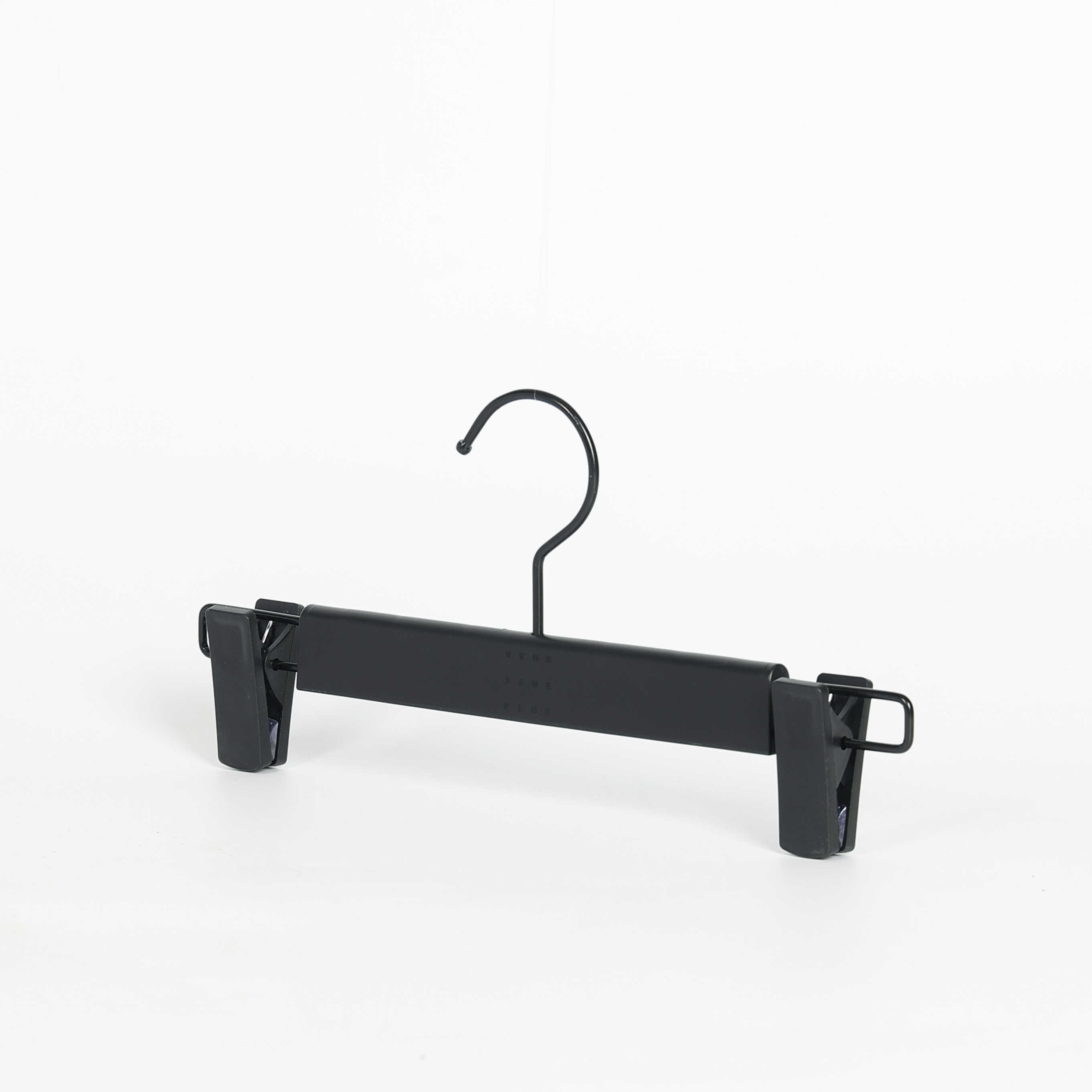 Percha antideslizante negra para pantalones con pinzas