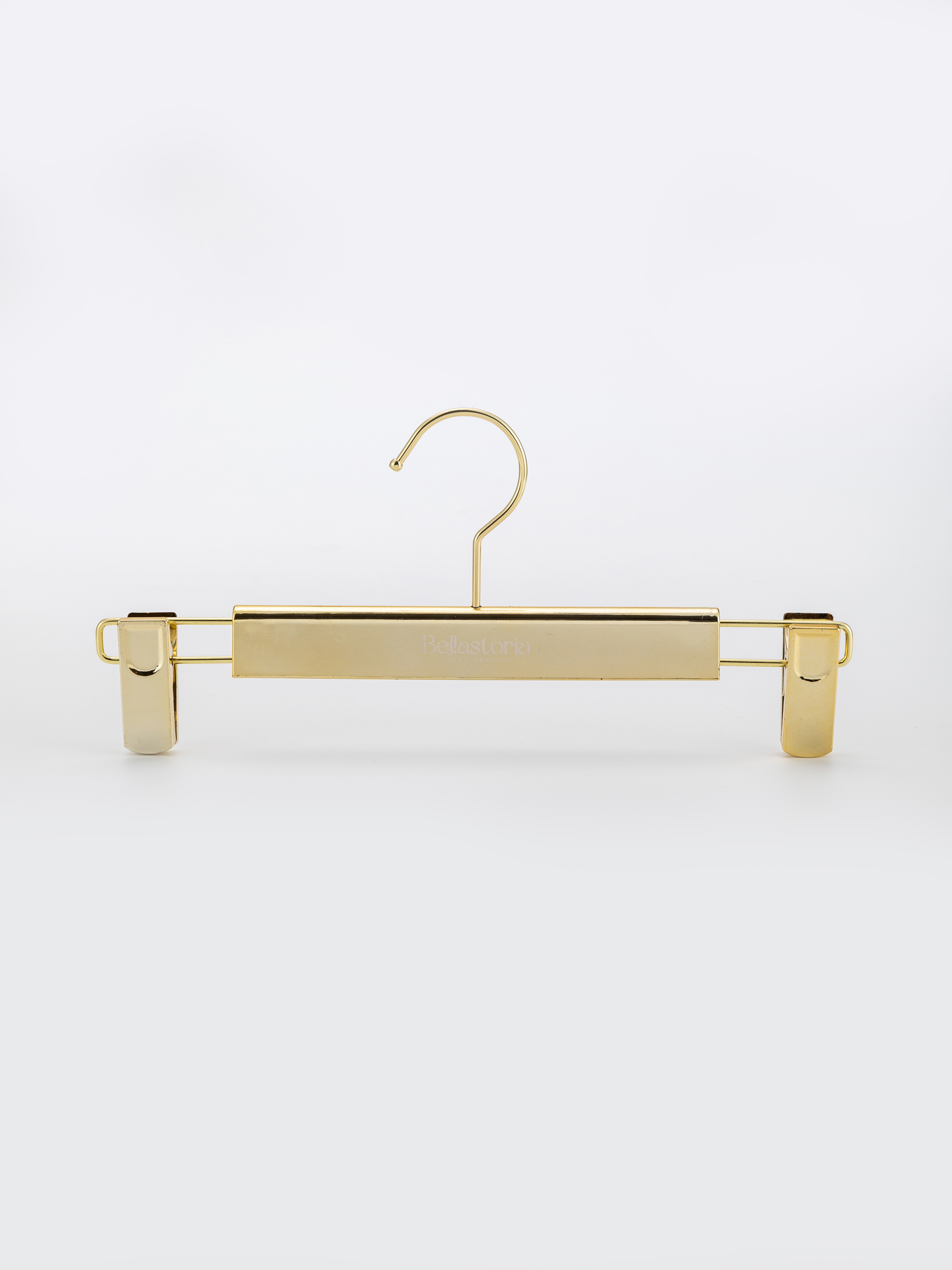 Percha de metal dorado de primera calidad con pinzas