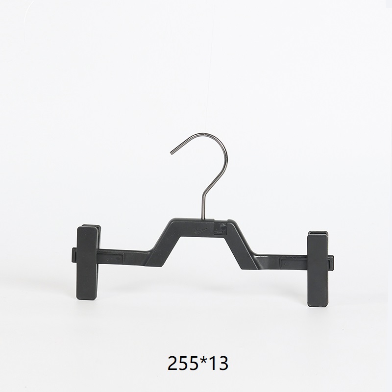 Cintre à pince en plastique noir durable pour pantalons et jupes