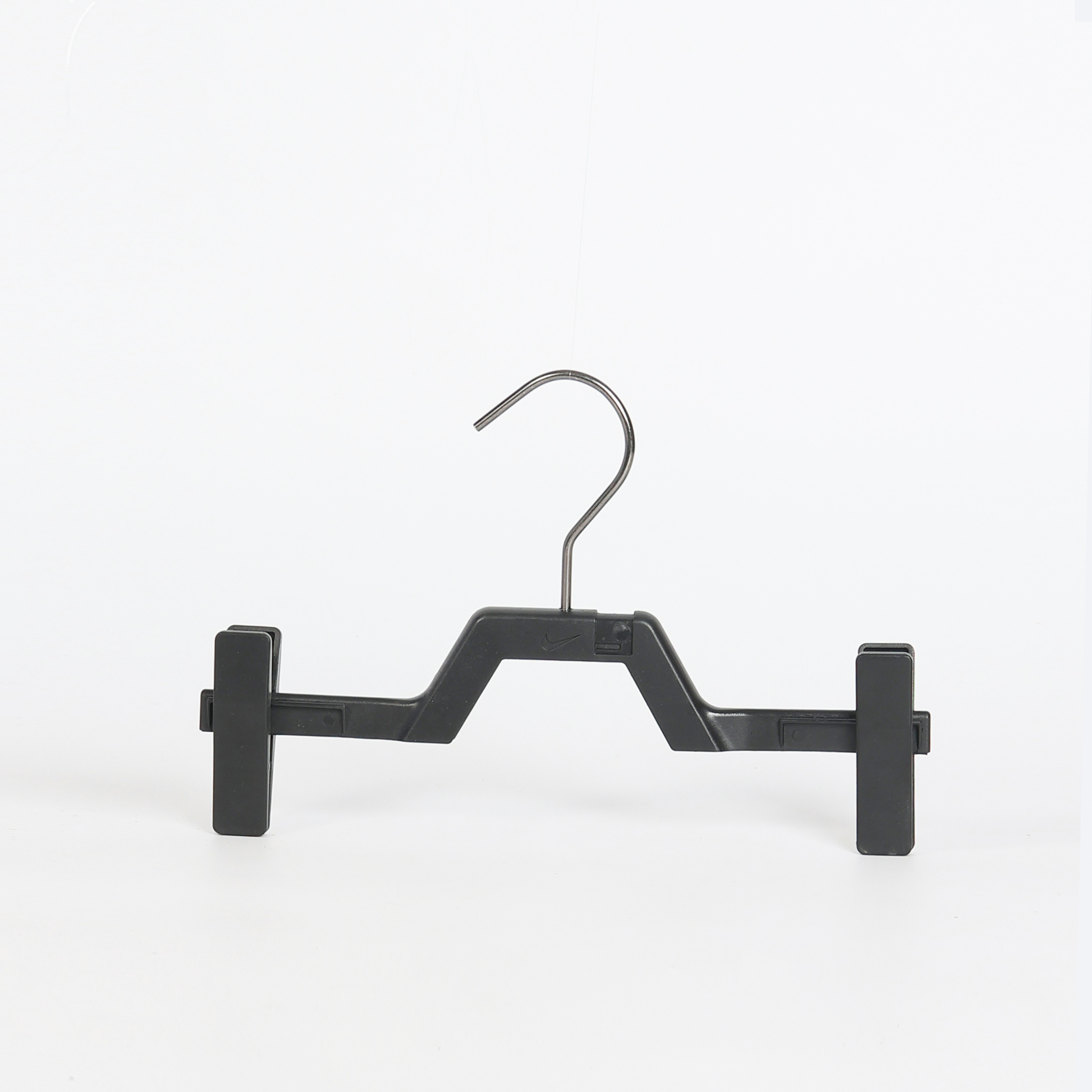 Cintre à pince en plastique noir durable pour pantalons et jupes