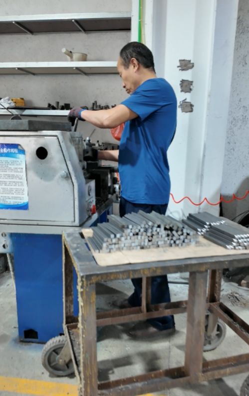 The master is making the base for the mannequin