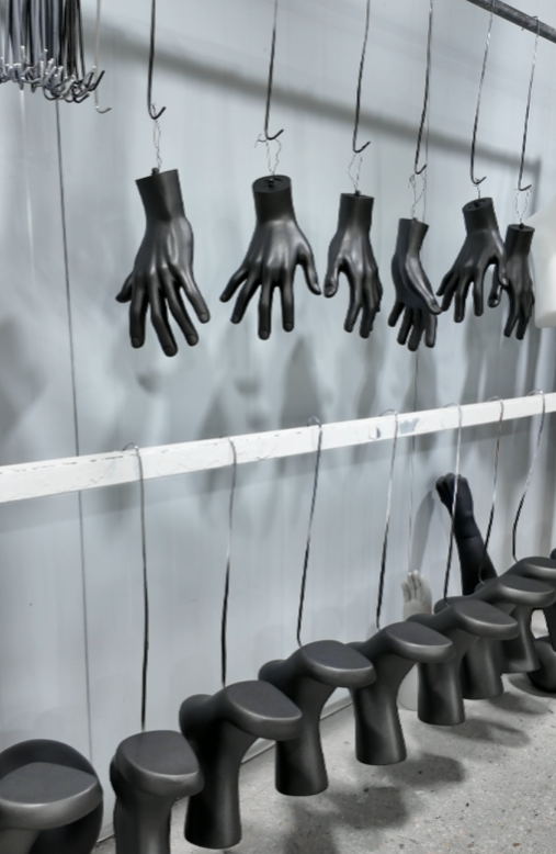 Sanding every edge and seam for a perfectly smooth finish.