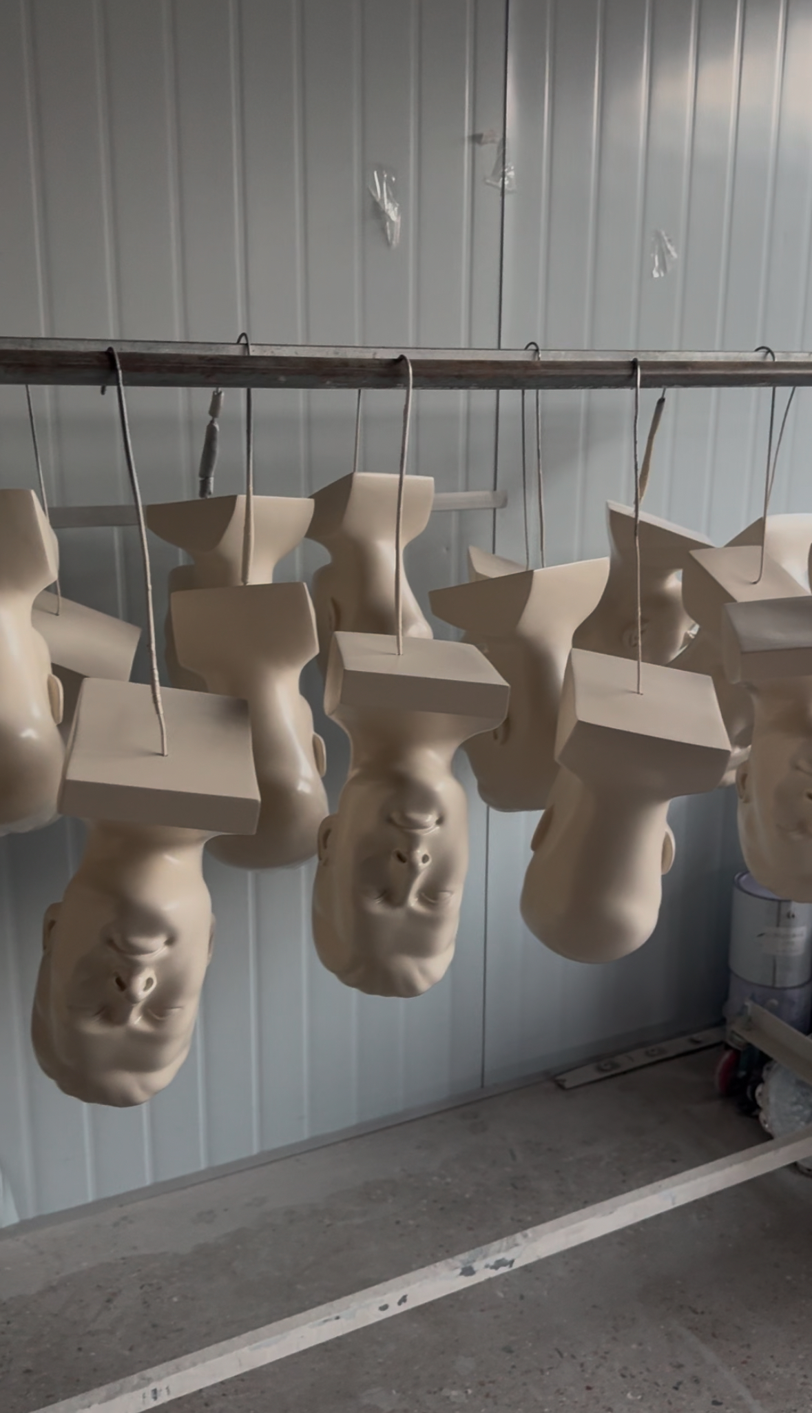 A semi-finished dummy head model that is being dried