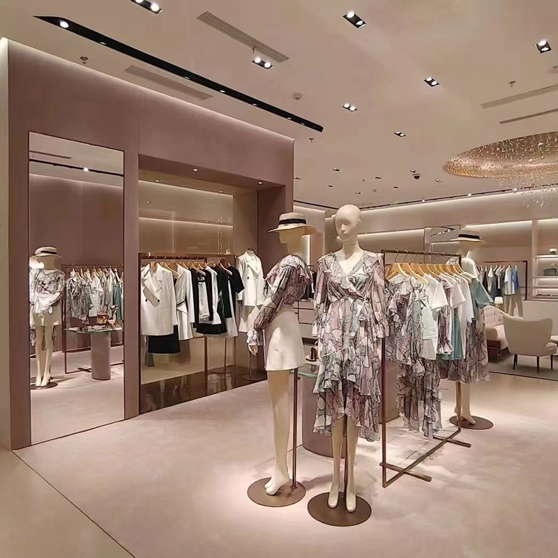 Elegant Mannequin Displays in Premium Womenswear Spaces