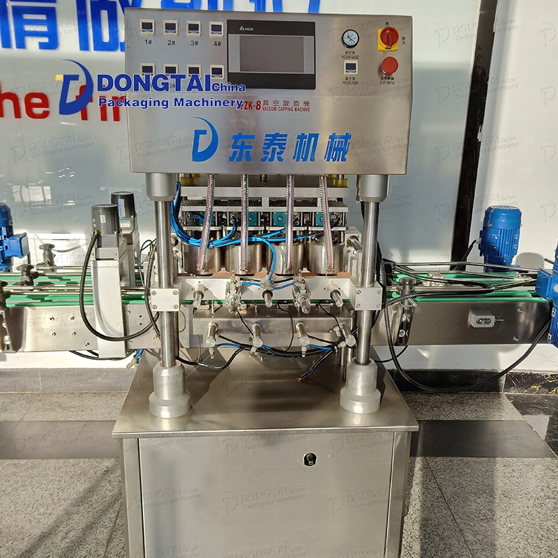 Китай Вакуумная укупорочная машина для стеклянных бутылок соуса Укупорочная машина для меда / томатного соуса / соуса чили, производитель