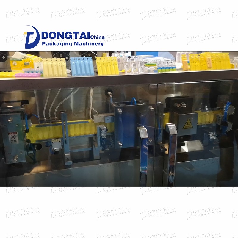 Automatic plastic ampoule filling and sealing machine