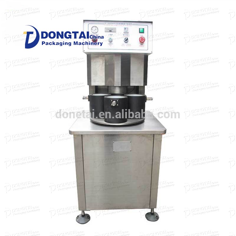 Semi-automatic vacuum filling and capping machine