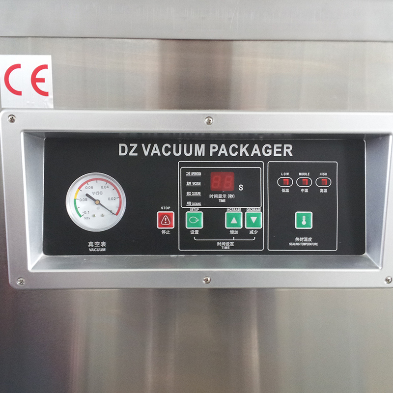 Food grain vacuum packaging machine