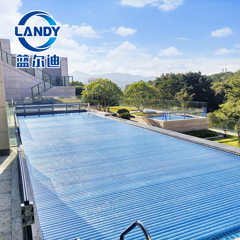 Coberturas de piscina automáticas de distribuição exclusiva com proteção UV azul transparente