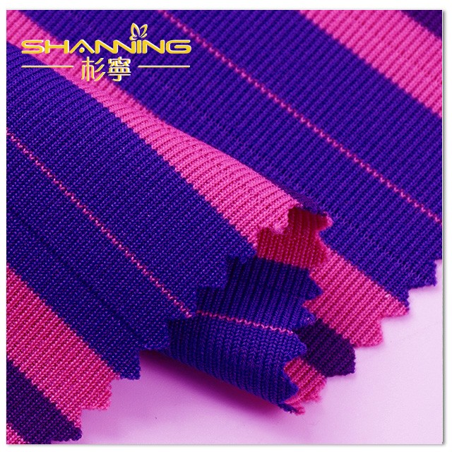 Tessuto in maglia tubolare a costine a righe tinte in filo di poliestere elastan