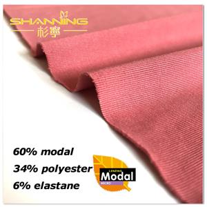 60% modal 34% polyester 6% élasthanne Tissu jersey teint uni avec lavage au sable