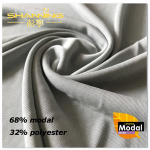 Tissu jersey 68% modal 32% polyester teint uni lavé au sable