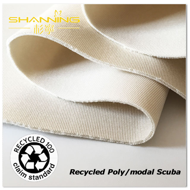46% Recycled Polyester 45% Modal 9% Elastane Solid Dyed Scuba Fabric