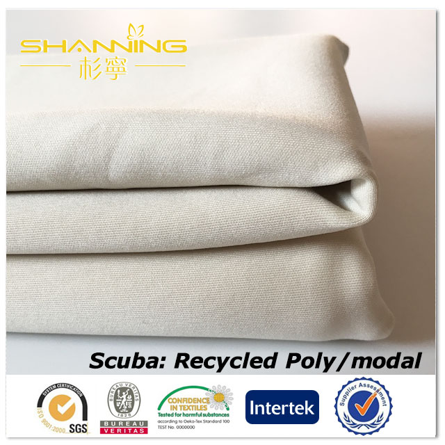 46% Recycled Polyester 45% Modal 9% Elastane Solid Dyed Scuba Fabric