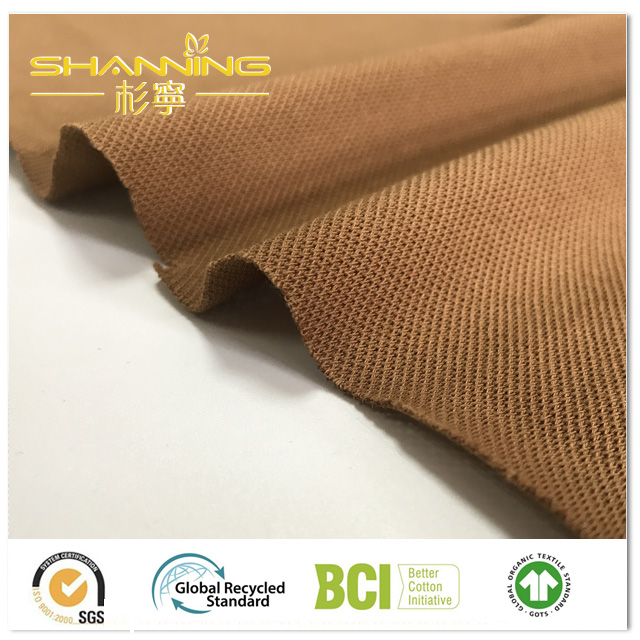 100% Combed Siro-Compact Cotton Pique Fabric With Enzyme Wash.