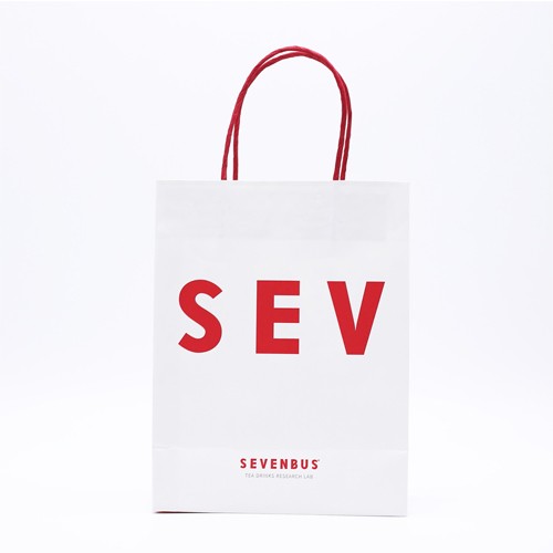 ミルクティーはハンドルが付いている白いクラフト紙袋を取り除きます 低価格ミルクティーはハンドルが付いている白いクラフト紙袋を取り除きます購買