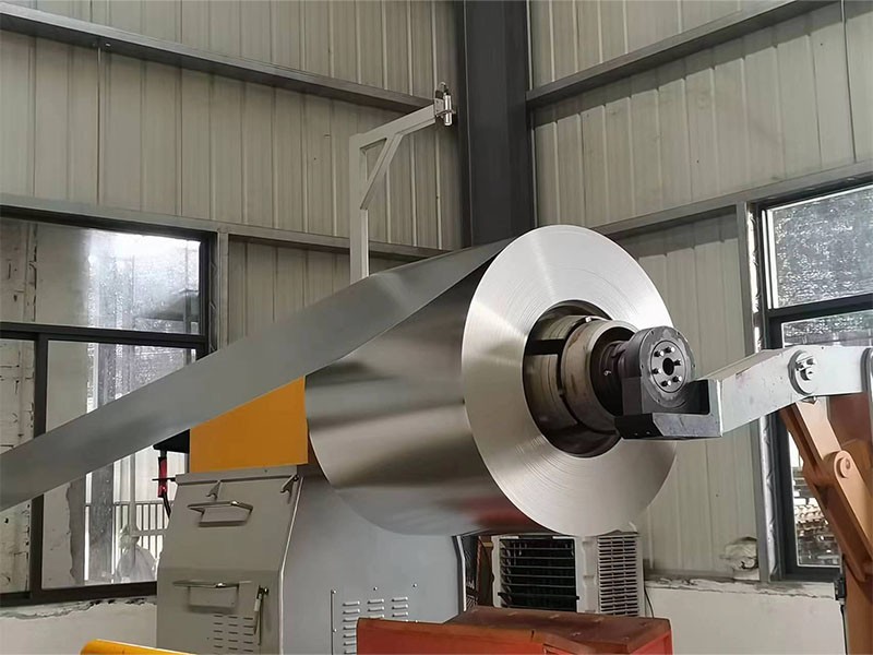 What is the carbon footprint of tinplate production?