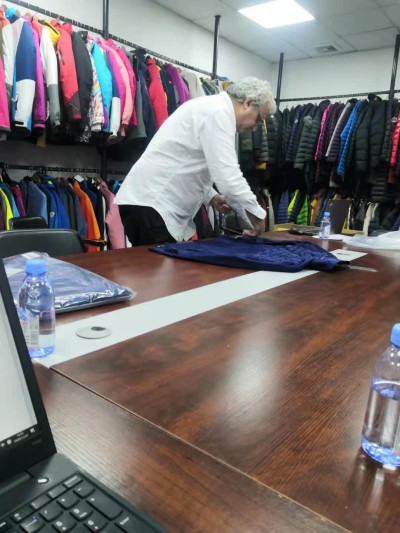 In-process inspection of Hot fused down filled vest