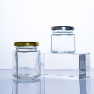 Barattolo di miele esagonale in vetro alimentare