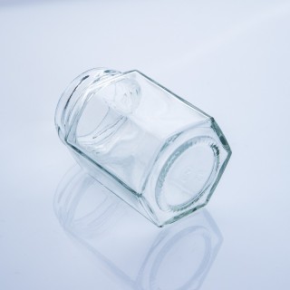 Barattolo di miele esagonale in vetro alimentare