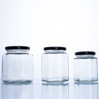 Barattolo di miele esagonale in vetro alimentare