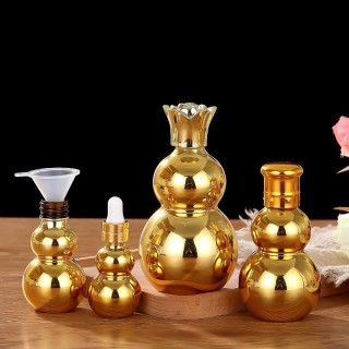 Bottiglia di olio essenziale d'oro