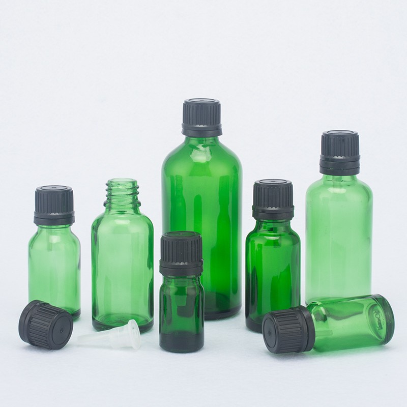 Grüne Kosmetik-Glasflasche mit Pipette