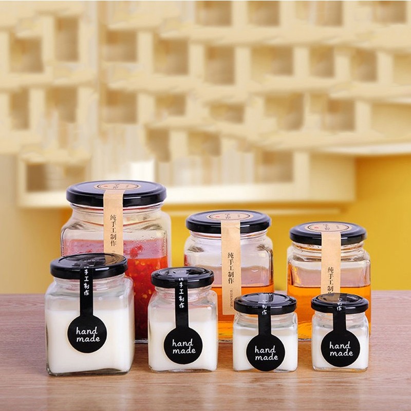 Fabricants de pots à miel en verre transparent avec couvercle