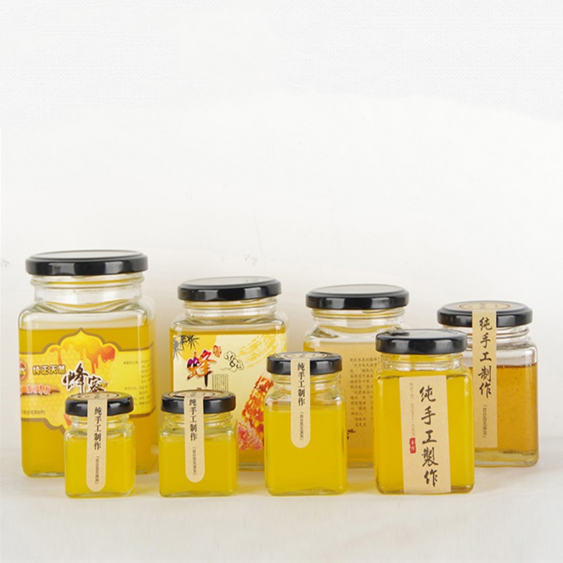 Fabricants de pots à miel en verre transparent avec couvercle