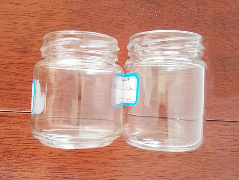 small glass honey jars