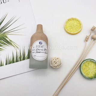 Bálsamo de fragancia vacío pequeño de marca simple creativo Frosted Clear Wooden Reed Difusor Botella de vidrio