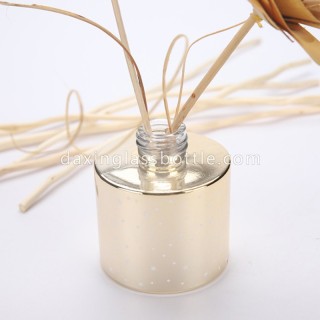 Personalizzazione della fabbrica Bottiglia di vetro con diffusore a lamella tonda in oro