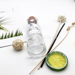 Bottiglia di vetro del diffusore a lamella rotonda del cilindro trasparente della stanza decorativa di lusso riutilizzabile all'ingrosso