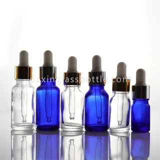 Botellas de spray de aceite esencial azul ámbar con gotero al por mayor